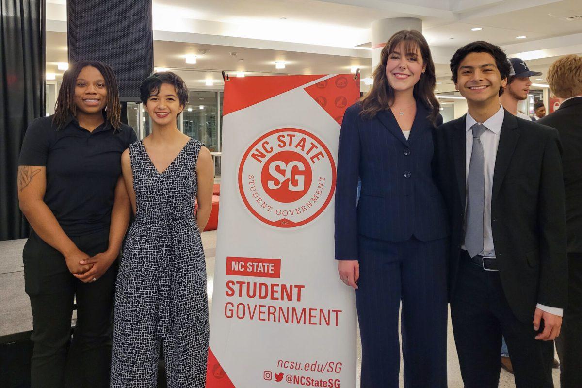 From left to right,&#160;Lanadia Adams, a third-year studying political science and criminology, Caroline Miranda, a second-year studying physics, Allison Markert, a third-year studying natural resources and Isaac Carreno, a fourth-year studying social work stand during the Student Government 2024 Spring Election Reveal Party&#160;in Talley Student Union on Wednesday, March 6, 2024.