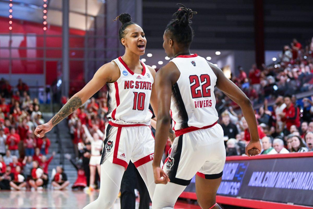 Junior guard Aziaha James (left) and junior guard Saniya Rivers (right) go in for a chest bump during the game against Tennessee in Reynolds Coliseum on Monday, March 25, 2024. James and Rivers had a combined 44 points scored. The Wolfpack beat the Lady Volunteers 79-72.