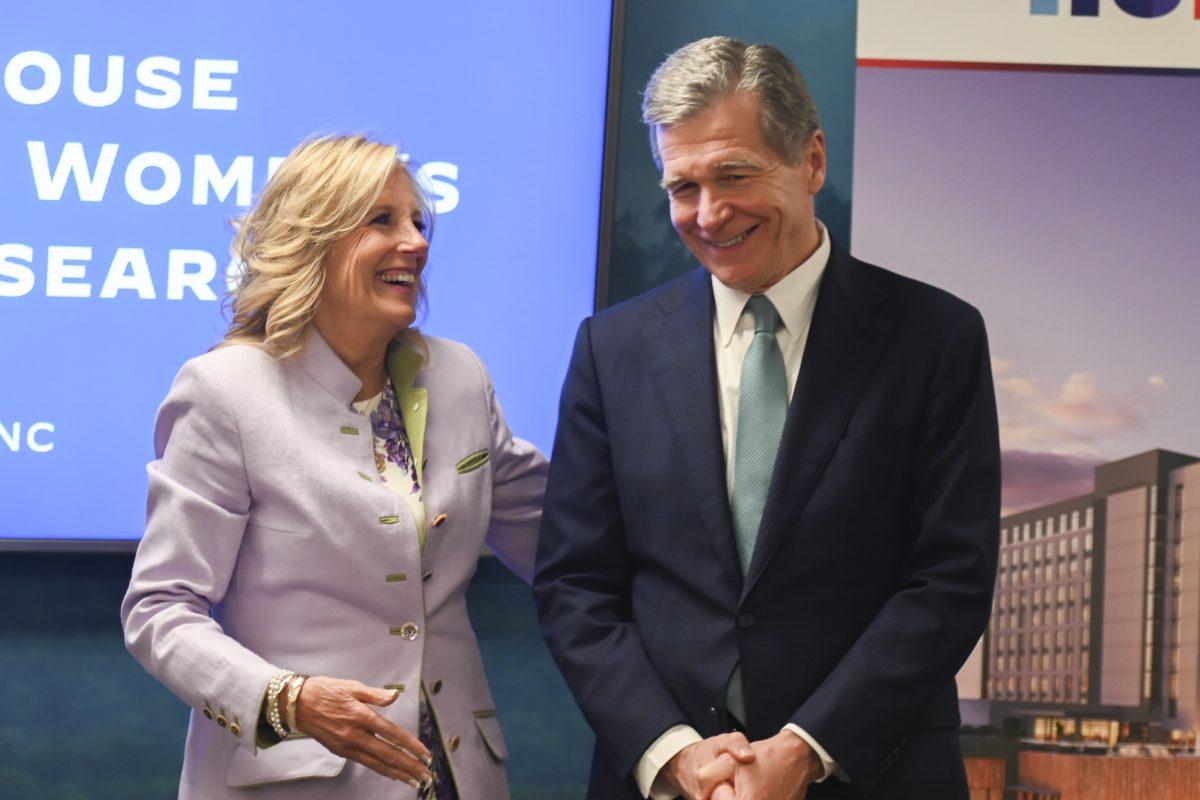 First Lady Dr. Jill Biden laughs with NC Governor Roy Cooper during her visit to Durham, North Carolina at Research Triangle Park on Wednesday, March 20, 2024. During the First Lady's visit, she highlighted the Biden Administration&#8217;s actions on women&#8217;s health research.