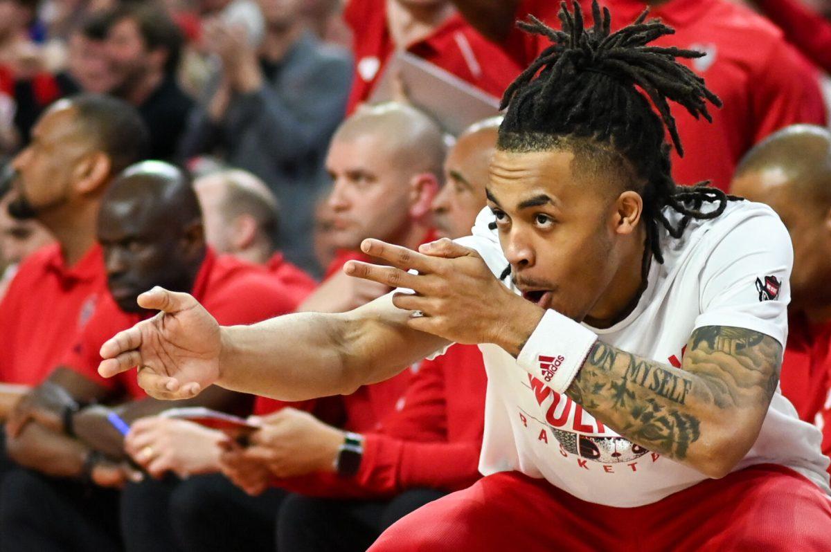 Junior guard Breon Pass celebrates an NC State three-pointer during the game versus the Duke Blue Devils in PNC Arena on Monday, March 4, 2024. The Wolfpack lost to the Blue Devils 79-64.