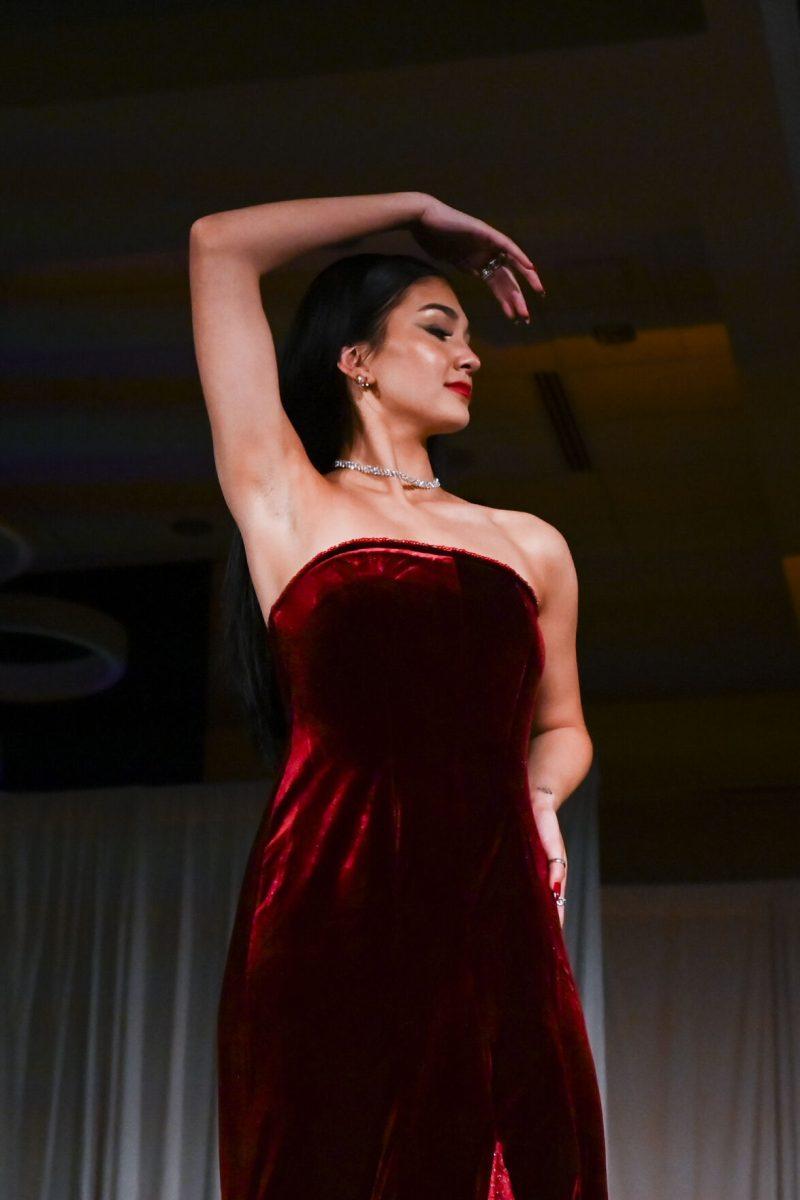 A model hits her pose at the end of the runway wearing a design from Lucy DeWolf's collection, "John," at the 26th Annual Fashion Expose in Tally Student Union on April 8, 2024. DeWolf won second place in the novice category.