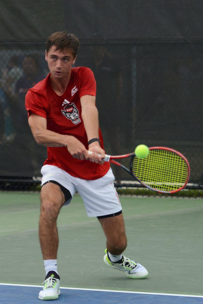 Junior Braden Shick returns the ball during the ACC Tournament quarterfinals match against Florida State at Cary Tennis Park on Friday, April 19, 2024. NC State lost 4-0 to Florida State.
