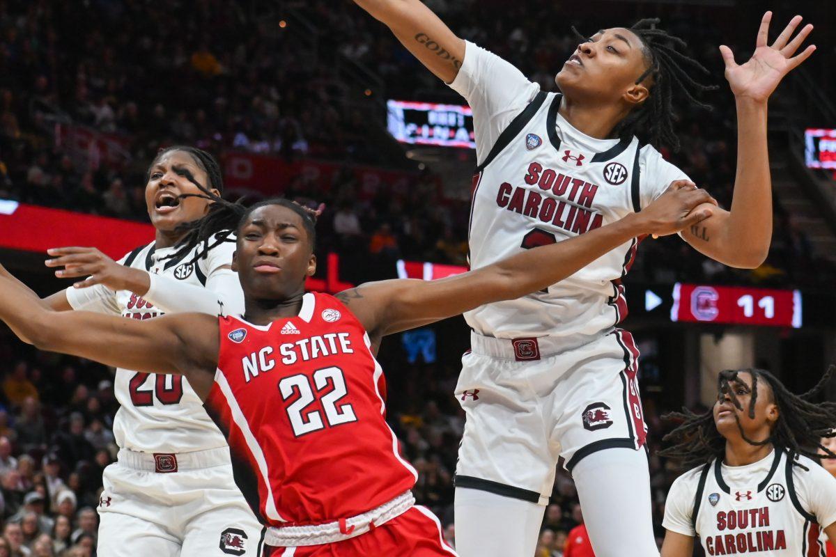 Junior guard Saniya Rivers falls during the game against South Carolina at Rocket Mortgage FieldHouse in Cleveland on April 5, 2024. The Wolfpack lost to the Gamecocks 78-59.