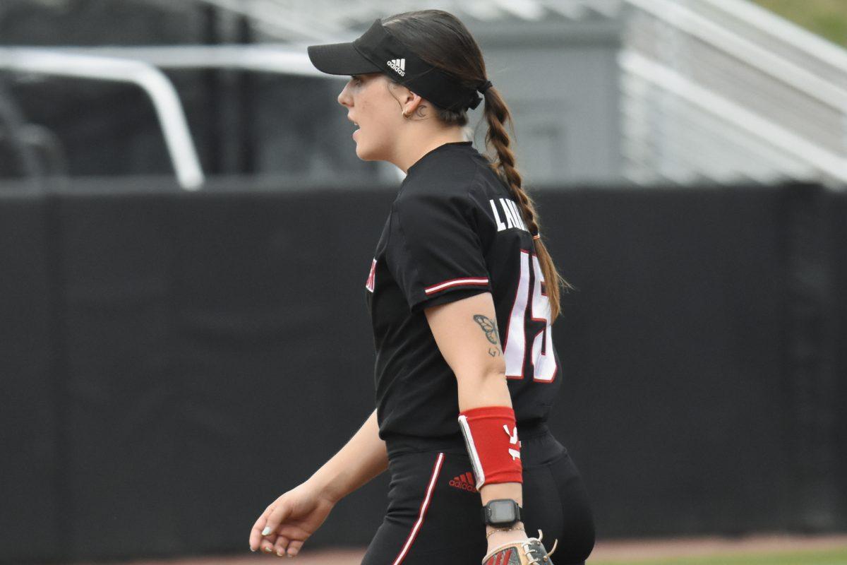 Senior infielder Kaylee Lambrecht encourages her teammates during the first game of the doubleheader against Queens University at Dail Softball Stadium on Tuesday, April 9, 2024. Lambrecht had two at bats with one hit and one run. NC State won the game 7-1.