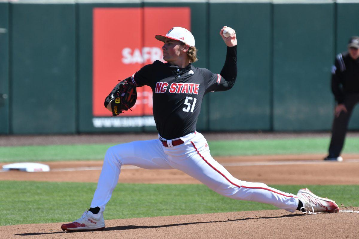 Sophomore pitcher Dominic Fritton pitches during the Wolfpack's last game in the home series against the Duke Blue Devils on Doak Field at Dail Park on Sunday, March, 24, 2024. The Wolfpack dropped the final game of the series to the Blue Devils 13-2, but won the series 2-1.
