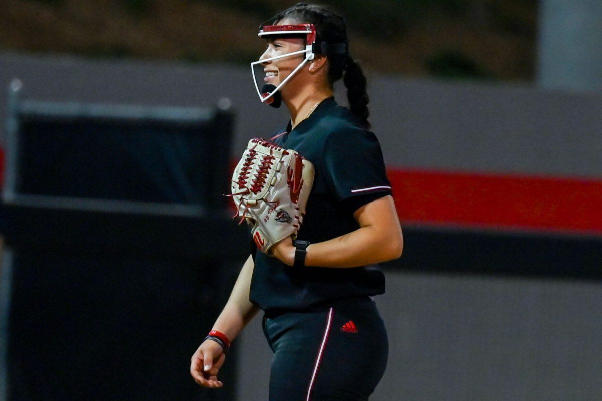 Freshman pitcher Kayla Fekel smiles during the game against Elon at Dail Softball Stadium on Tuesday, April 2, 2024. Fekel pitched in one inning. NC state won the game 12-2.