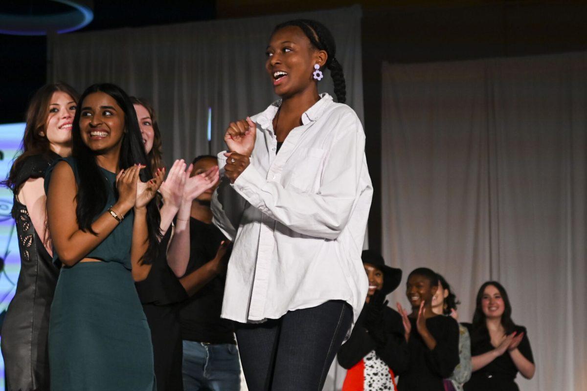 Anaya Harnett, a fourth-year studying fashion and textile management, is announced as the third place winner in the intermediate and beyond category at the 26th Annual Fashion Expose in Tally Student Union on April 8, 2024. The Expose is a part of Pan-Afrikan Week and was hosted by the African American Textile Society.