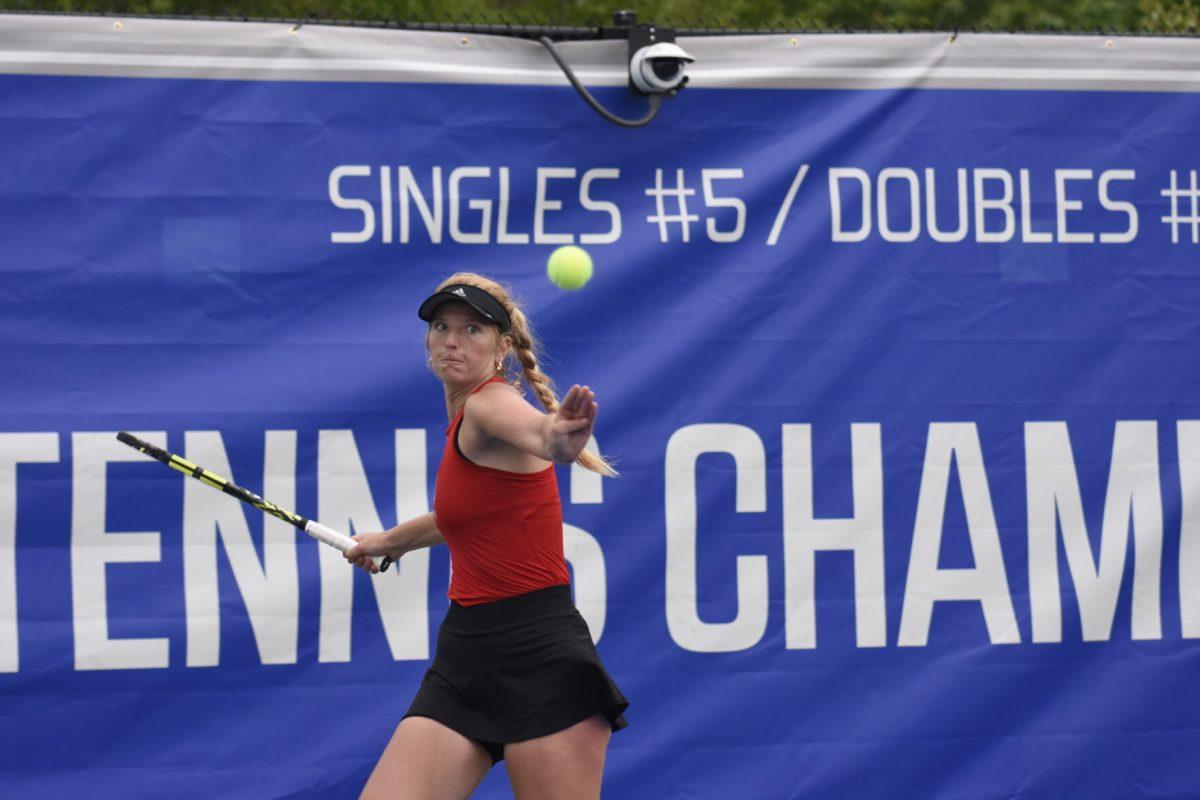 Freshman Maddy Zampardo purses their lips in concentration while aiming for the ball during&#160;the ACC Tournament quarterfinals match against Clemson at Cary Tennis Park on Friday, April 19, 2024. Zampardo won their singles match. NC State beat Clemson 4-0.