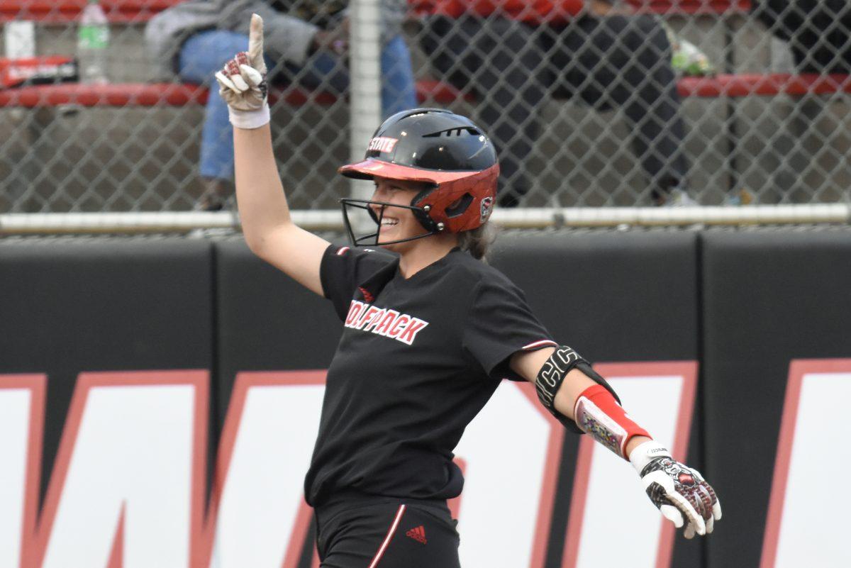 Junior infielder Taylor Ensley celebrates after hitting a home run during the second game of the doubleheader against Queens University at Dail Softball Stadium on Tuesday, April 9, 2024. Ensley had three at bats with one run and one hit. NC State won the game 8-1.