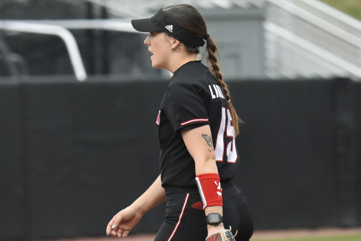 Senior infielder Kaylee Lambrecht encourages her teammates during the first game of the doubleheader against Queens University at Dail Softball Stadium on Tuesday, April 9, 2024. Lambrecht had two at bats with one hit and one run. NC State won the game 7-1.