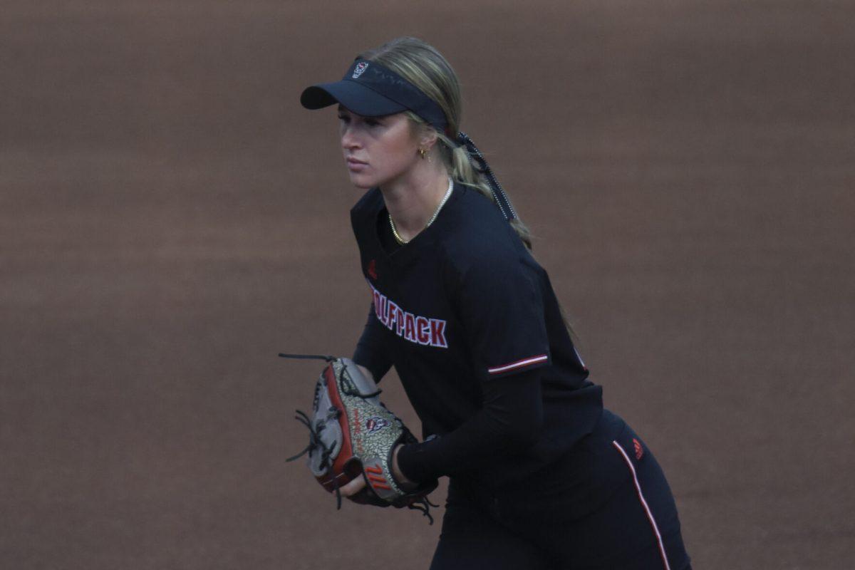 Sophomore pitcher Rylee Wyman adjusts her grip on the ball during the second game of the doubleheader against Queens University at Dail Softball Stadium on Tuesday, April 9, 2024. Wyman threw in four innings. NC State won the game 8-1.
