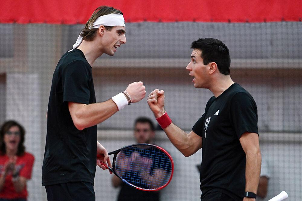Senior Robin Catry and senior Luca Staeheli celebrate scoring a point during the match against Columbia at J.W. Isenhour Tennis Center on Sunday, Feb. 4, 2024. NC State lost to Columbia 4-3.
