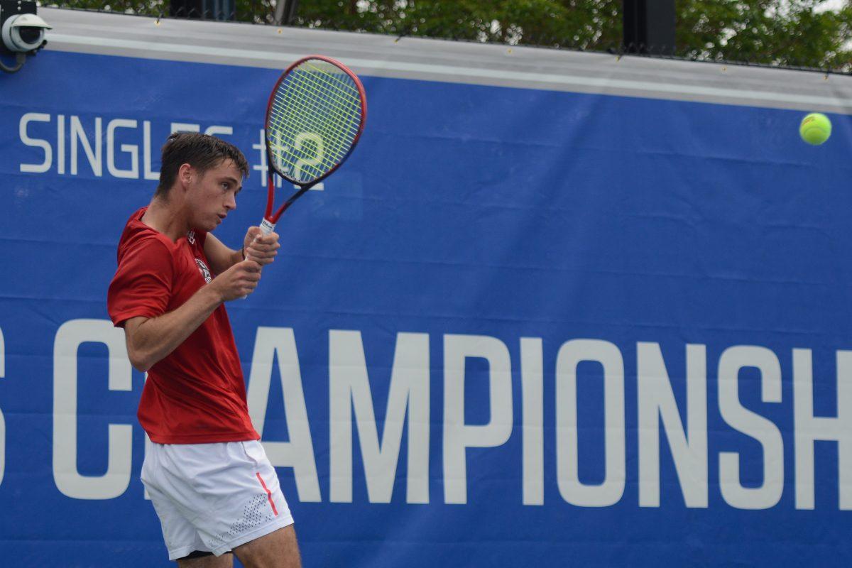 Junior Braden Shick backhands the ball during the ACC Tournament quarterfinals match against Florida State at Cary Tennis Park on Friday, April 19, 2024. NC State lost 4-0 to Florida State.