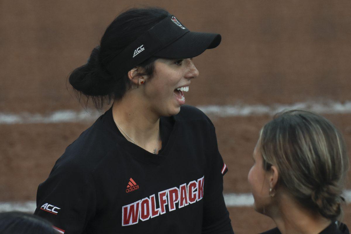 Junior infielder Alaina Smith hypes up her team before the second game of the doubleheader against Queens University at Dail Softball Stadium on Tuesday, April 9, 2024. Smith had three at bats with one hit. NC State won the game 8-1.