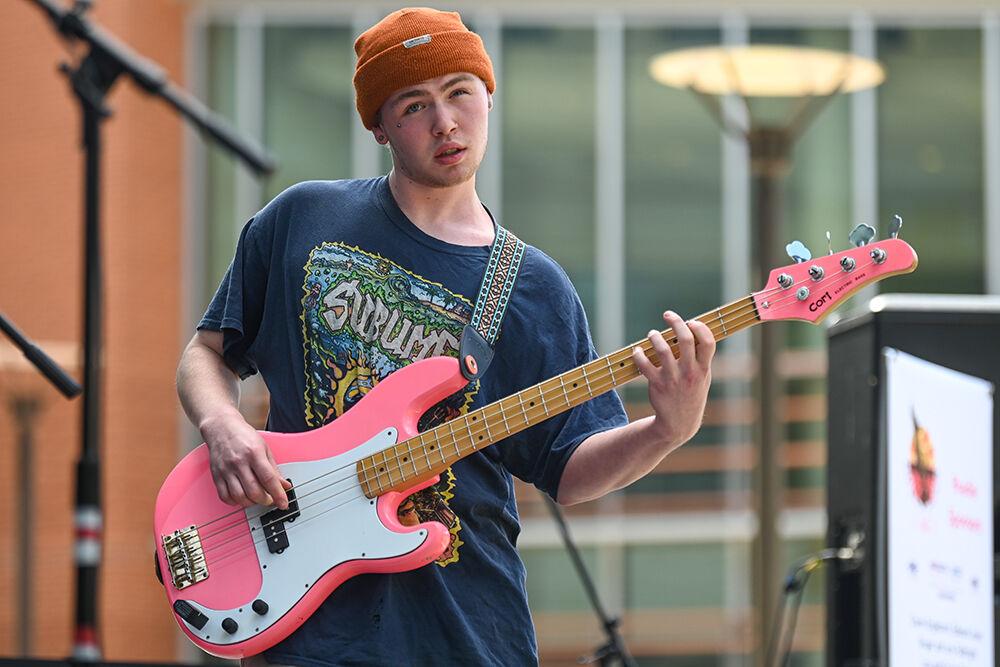 Cody Everest, the bassist for Juniper Avenue, plays the bass guitar at the Maintain Your Brain Battle of the Bands event at Stafford Commons on Saturday, April 15, 2023. Maintain Your Brain was founded by NC State student Charlotte Fullbright, a second-year studying integrative physiology and neurobiology. The money raised at this years Battle of the Bands was used to increase awareness of mental health, stroke, dementia, traumatic brain injury and concussion.