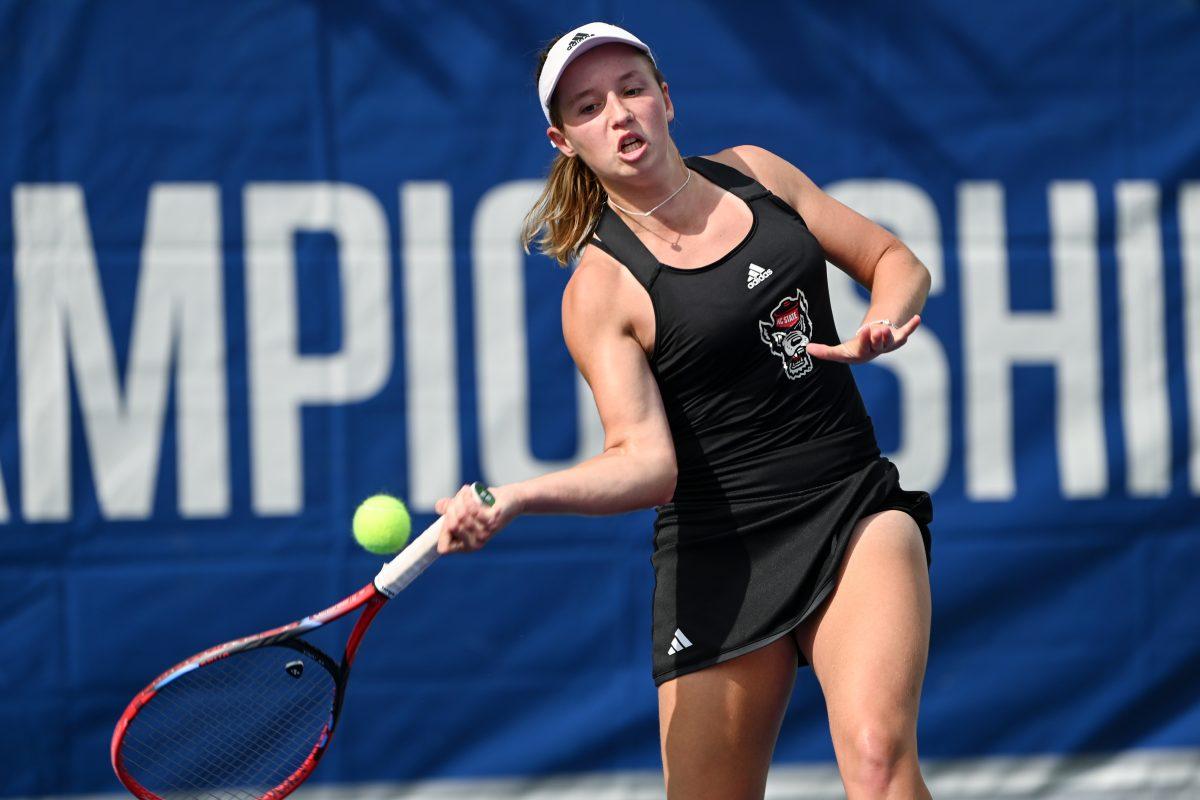Senior Gina Dittmann forehands the ball during the ACC Tournament semifinals match against UNC-Chapel Hill at Cary Tennis Park on Saturday, April 20, 2024. NC State lost to Chapel Hill 4-0.