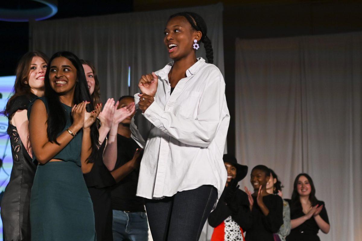 Anaya Harnett, a fourth-year studying fashion and textile management, is announced as the third place winner in the intermediate and beyond category at the 26th Annual Fashion Expose in Tally Student Union on April 8, 2024. The Expose is a part of Pan-Afrikan Week and was hosted by the African American Textile Society.