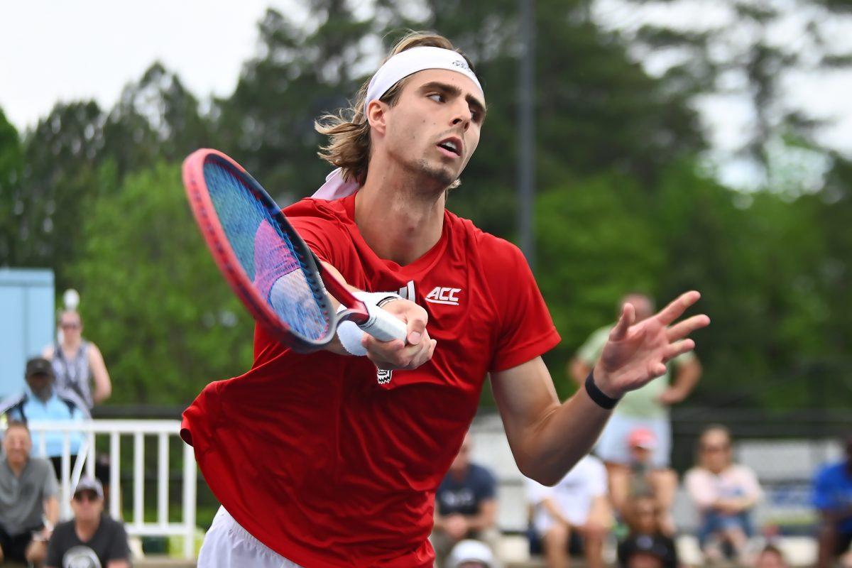 Senior Robin Catry lunges for the ball during the match versus Florida State at the ACC Men's Tennis Quarterfinals at Cary Tennis Park on Friday, April 19, 2024. NC state lost 4-0 to Florida State.