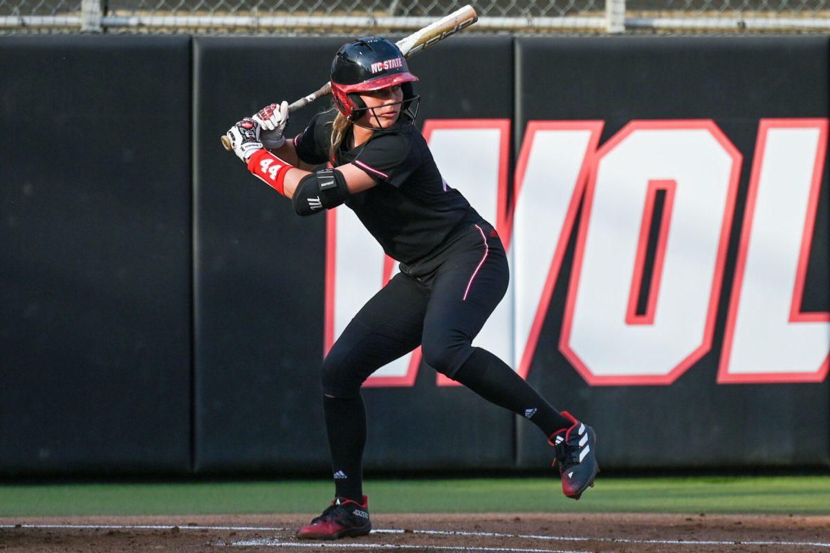 Junior infielder Taylor Ensley begins her swing while at bat during the game against Elon at Dail Softball Stadium on Tuesday, April 2, 2024. Ensley had four at bats with one run and two hits. NC state won the game 12-2.