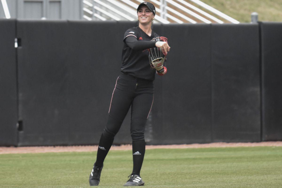 Sophomore outfielder Bailey Edwards throws the ball to her pitcher after catching the third out during the first game of the doubleheader against Queens University at Dail Softball Stadium on Tuesday, April 9, 2024. NC State won the game 7-1.