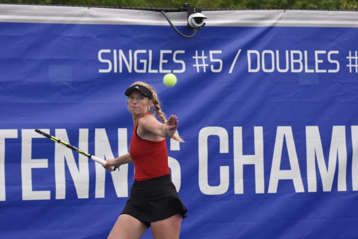 Freshman Maddy Zampardo purses their lips in concentration while aiming for the ball during&#160;the ACC Tournament quarterfinals match against Clemson at Cary Tennis Park on Friday, April 19, 2024. Zampardo won their singles match. NC State beat Clemson 4-0.