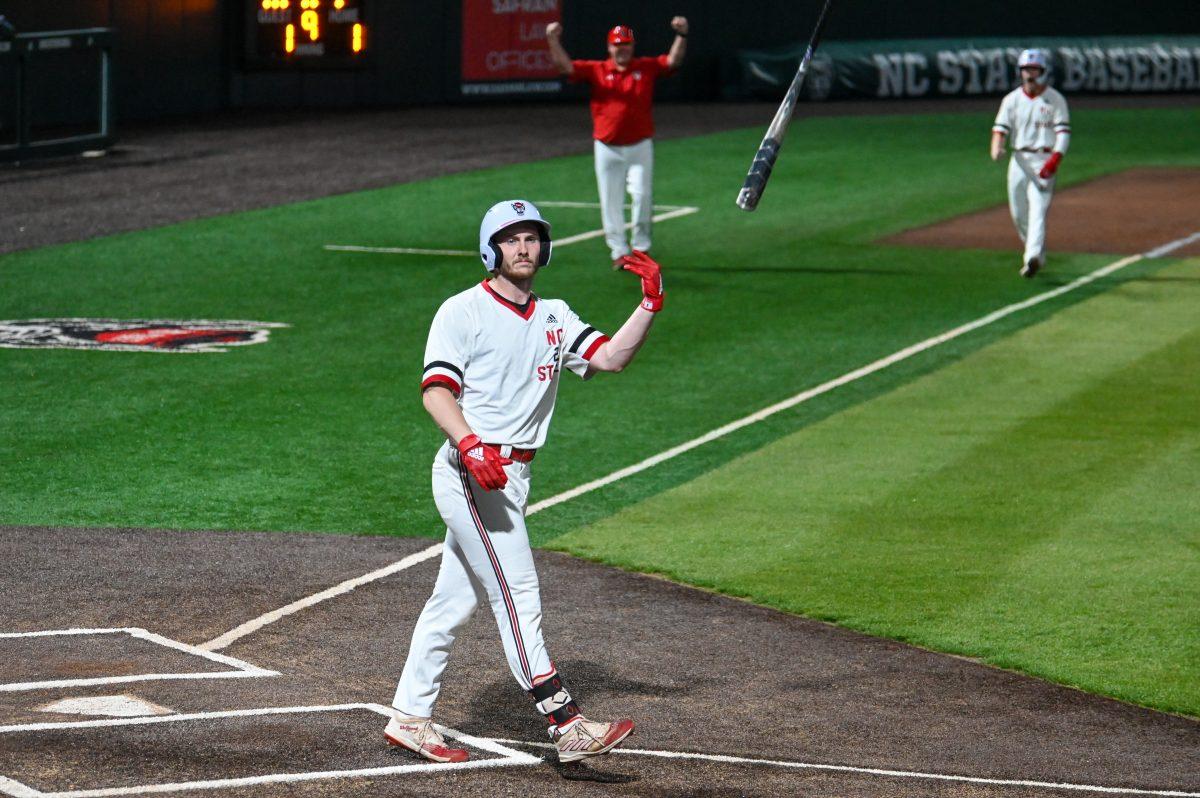 Senior outfielder Noah Soles flips his bat after earning a walk-off walk during the game against Wake Forest on Friday, May 17, 2024. The Wolfpack defeated the Demon Deacons 2-1.