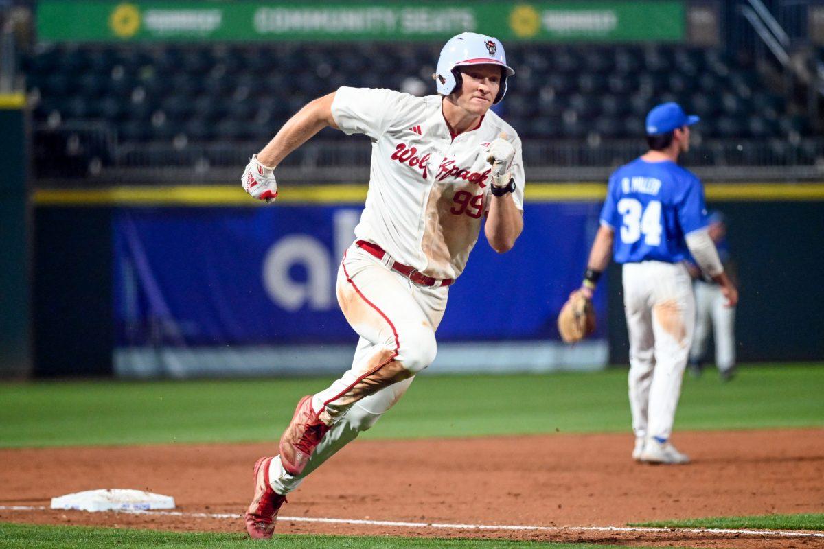 Graduate infielder Alec Makarewicz runs to home plate during the ACC Tournament game against Duke at Truist Field in Charlotte on Thursday, May 23, 2024. Makarewicz scored one run. NC State lost to Duke 8-1.