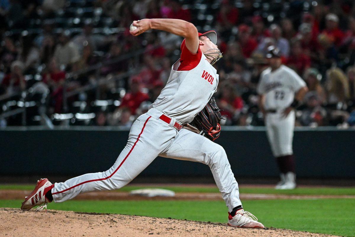Freshman pitcher Jaxon Lucas pitches during the ACC Tournament game against Virginia Tech at Truist Field in Charlotte on Wednesday, May 22, 2024. Lucas recorded two strikeouts in 1.0 innings pitched. NC State beat Virginia Tech 19-9 in eight innings.