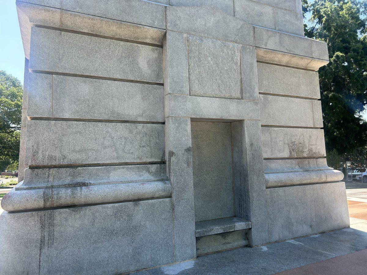 Remnants of spray-painted, Pro-Palestinian messages remain on the Memorial Belltower after vandalism occurred on Tuesday, May 28, 2024.