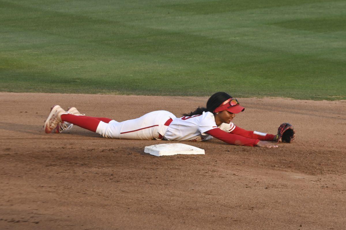 Sophomore short stop Makayla Marbury slides to catch a ball and misses during tha game against Duke at Dail Softball Field on April 26, 2024. This fumble allowed Duke to get on base. NC State lost to Duke 4-3.