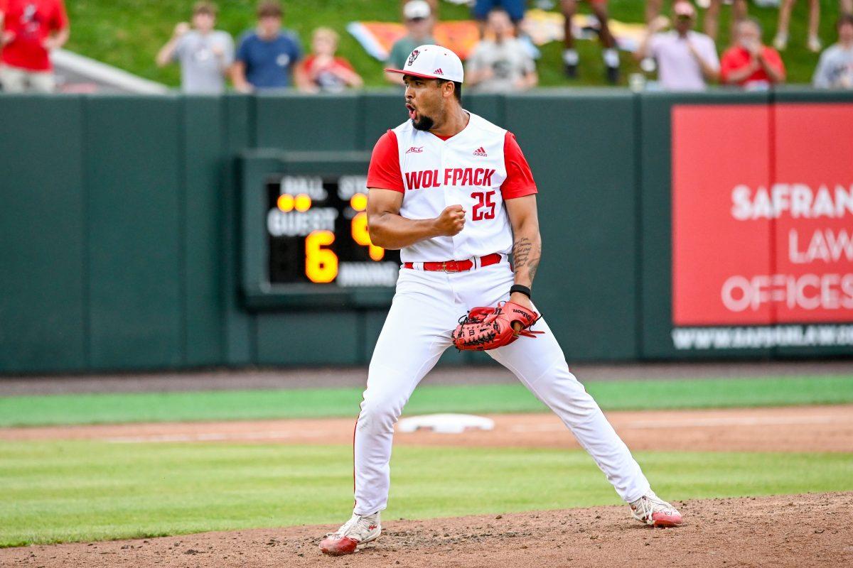 Sophomore pitcher Derrick Smith celebrates closing out the ninth inning of the game against Wake Forest at Doak Field at Dail Park on Saturday, May 18, 2024. Smith struck out three batters in 1.0 innings pitched to record the save. NC State beat Wake Forest 9-6 and swept the series.