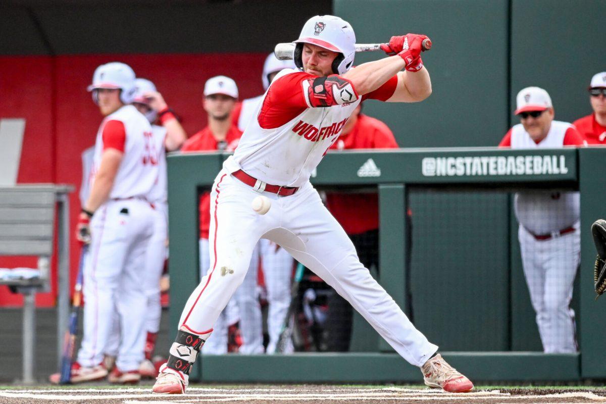 Senior outfielder Noah Soles gets hit by a pitch during the game against Wake Forest at Doak Field at Dail Park on Saturday, May 18, 2024. Soles stole one base and scored one run. NC State beat Wake Forest 9-6 and swept the series.