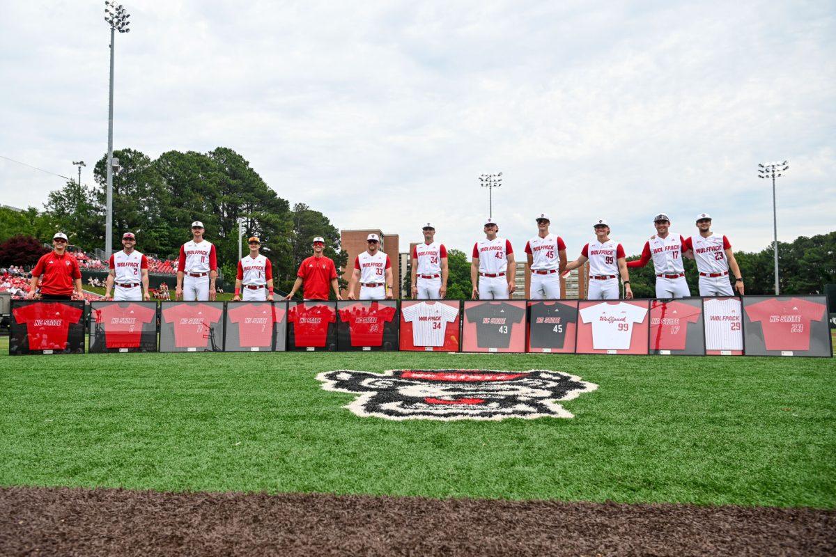 NC State seniors stand together and celebrate Senior Day before the game against Wake Forest at Doak Field at Dail Park on Saturday, May 18, 2024. NC State beat Wake Forest 9-6 and swept the series.