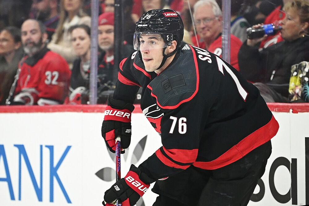 Defenseman Brady Skjei passes the puck during the Carolina Hurricanes game versus the Pittsburgh Penguins at PNC Arena on Saturday, Nov. 18, 2023. The Hurricanes beat the Penguins 4-2.