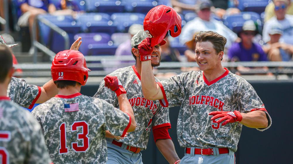 Sophomore catcher Patrick Bailey celebrates his home run with his teammates against ECU on Sunday, June 2, 2019 at Clark-LeClair Stadium in Greenville. Bailey went 1-3 with one home run and one walk in the Wolfpack&#8217;s season-ending 9-2 loss.