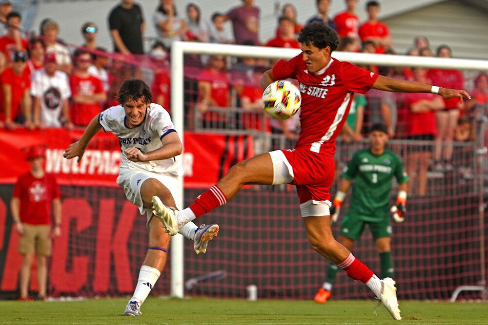 Fifth-year Eitan Rosen attempts to block a pass during the match between NC State and High Point at Dail Soccer Field on Thursday, Aug. 22, 2024. NC State beat High Point 3-2.