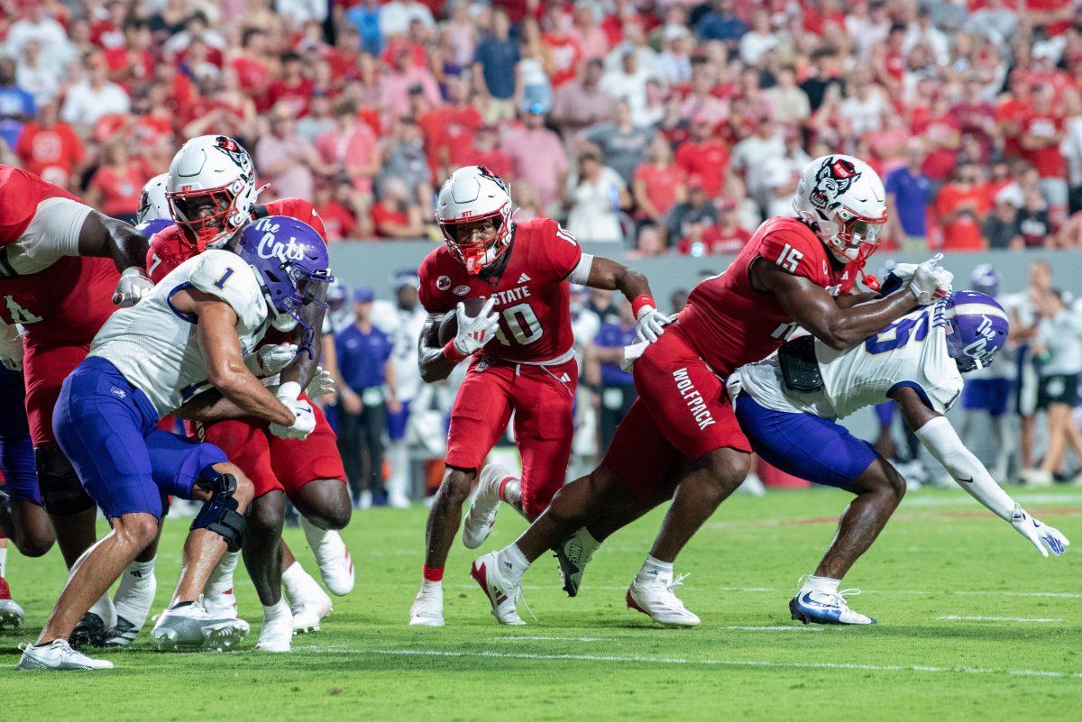 Sophomore wide receiver KC Concepcion looks for an opening during the game against Western Carolina at Carter-Finley Stadium on Thursday, Aug. 29, 2024. Concepcion had 121 yards receiving. The Wolfpack defeated the Catamounts 38-21.