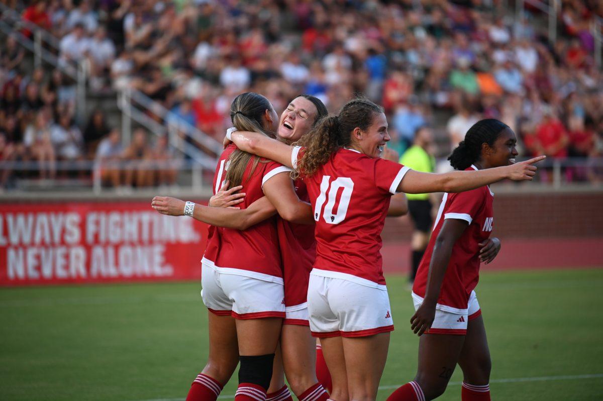 Wolfpack players embrace after a goal during NC State's home game against Charlotte at Dail Soccer Field on Wednesday, Aug. 28, 2024. The Wolfpack beat the 49ers 3-1.