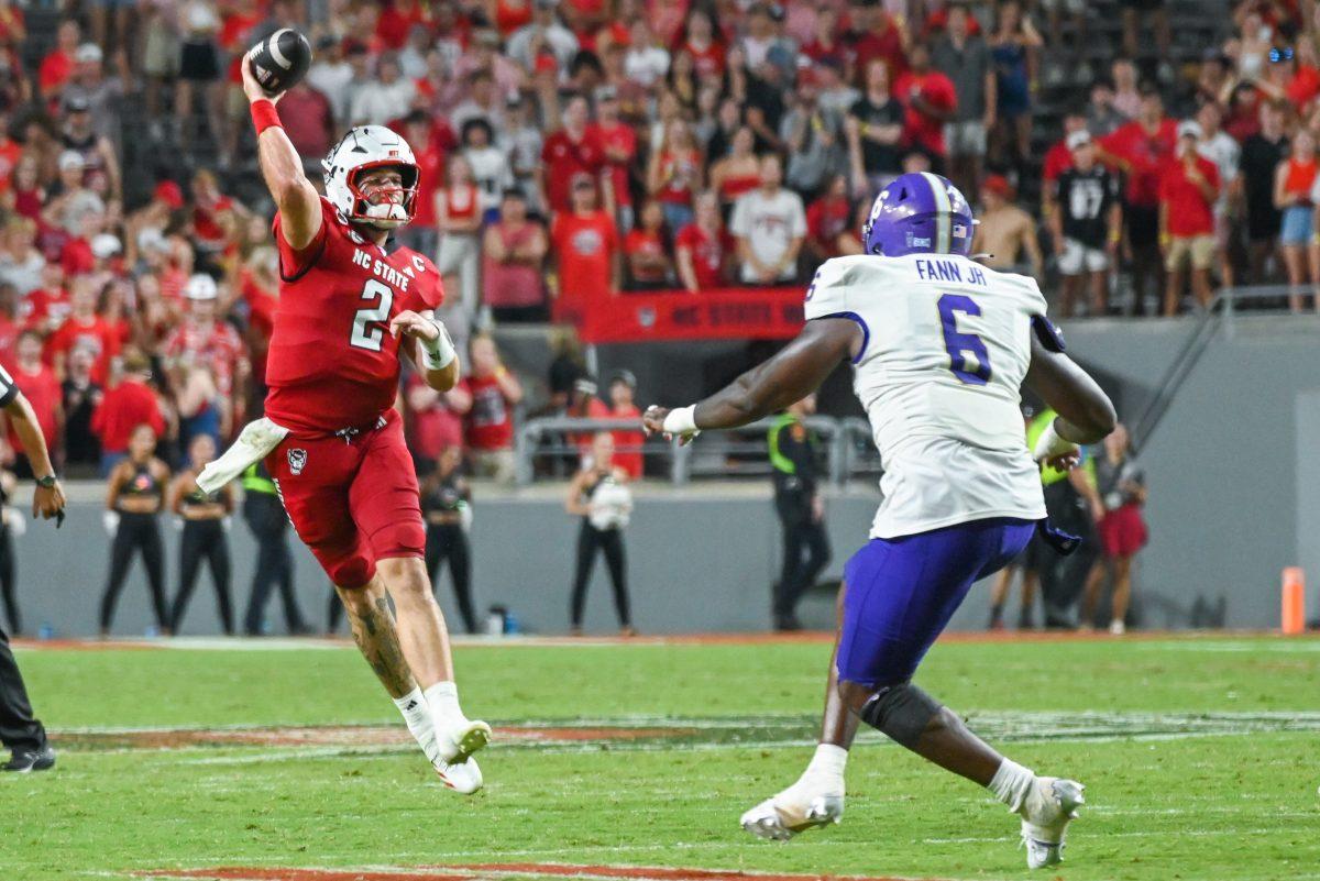 Graduate quarterback Grayson McCall throws the ball during the game against Western Carolina at Carter-Finley Stadium on Thursday, Aug. 29, 2024. The Wolfpack defeated the Catamouts 38-21.