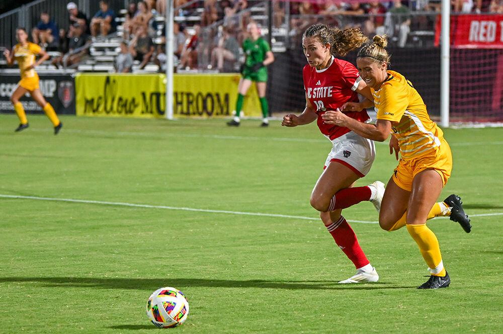 Senior midfielder Annika Wohner chases after the ball during the match against Appalachian State University at Dail Soccer Field on Thursday, Aug. 15, 2024. The Wolfpack and the Mountaineers tied 0-0.