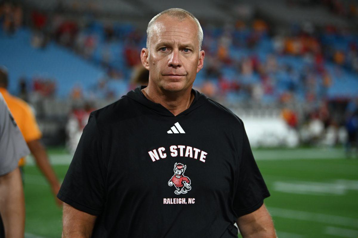 Head coach Dave Doeren walks off the field after of the Wolfpack's game against the Tennessee Volunteers in Bank of America Stadium for the Duke's Mayo Classic on Saturday, Sept. 8, 2024. The Wolfpack lost to the Volunteers 51-10.