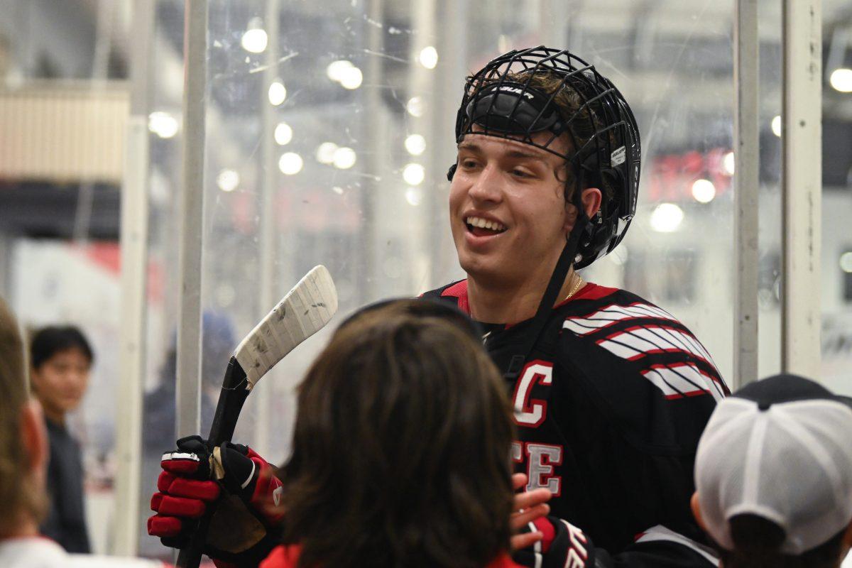 Junior forward Zach Herman fist bumps young fans after the game against High Point University at Invisalign Arena on Friday, Sept. 6, 2024. Herman scored the three goals. NC State won 8-2.