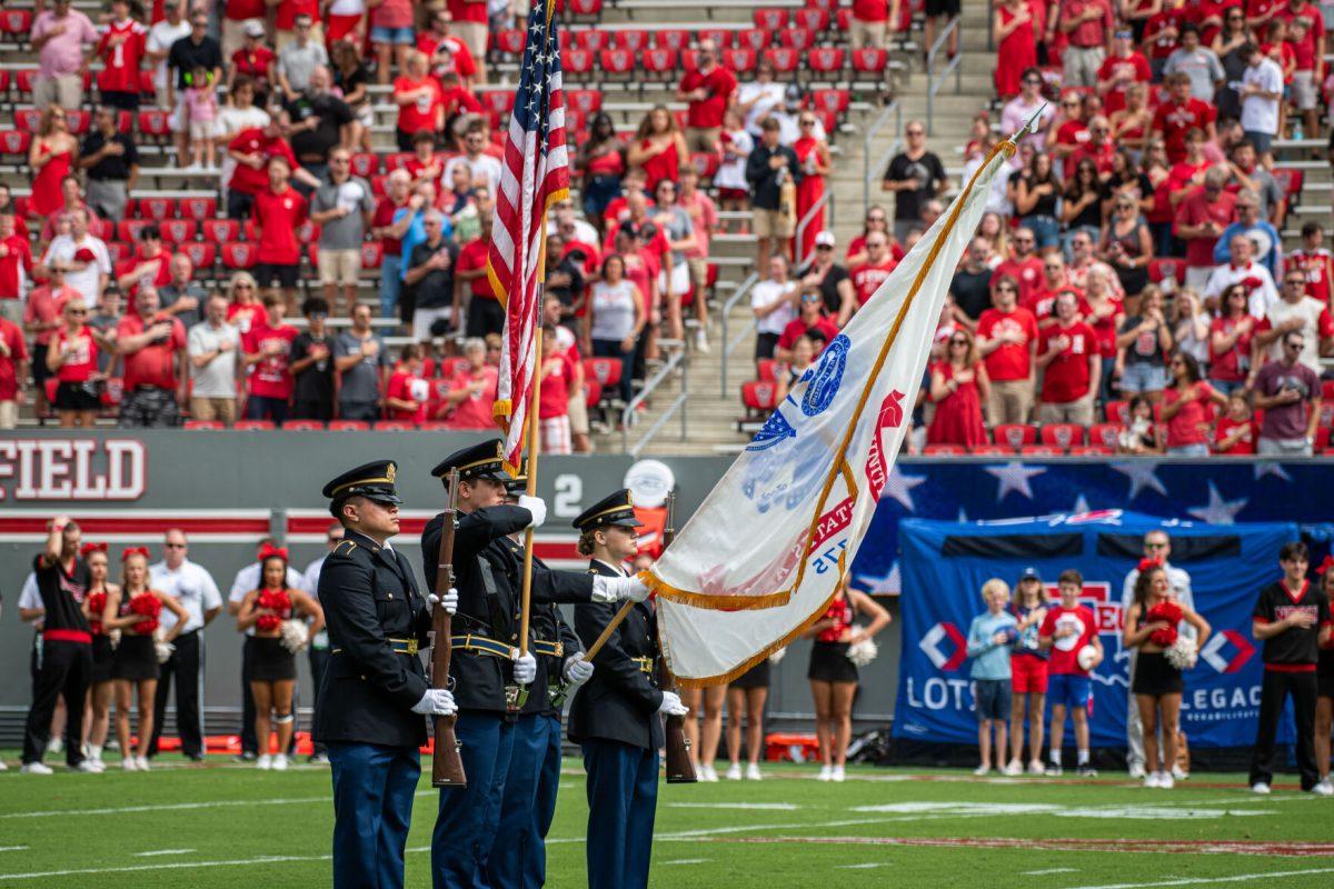 Members of the NC State Army ROTC Color Guard present the colors for the national anthem during the game against LA Tech at Carter-Finley Stadium on Saturday, Sept. 14, 2024. The Wolfpack beat the Bulldogs 30-20