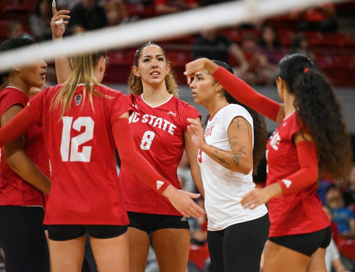 Graduate setter Naomi Cabello reacts after a close call during the match against Virginia in Reynolds Coliseum on Sunday, Sept. 29, 2024. Cabello had 14 digs. NC State beat Virginia 3-1.