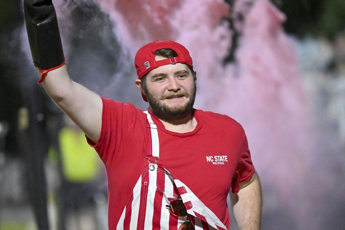 Bishop McGregor, a second-year studying biology, runs past the student section after a goal during the game against Cal at Dail Soccer Field on Friday, Sept. 6, 2024. NC State beat Cal 2-1.