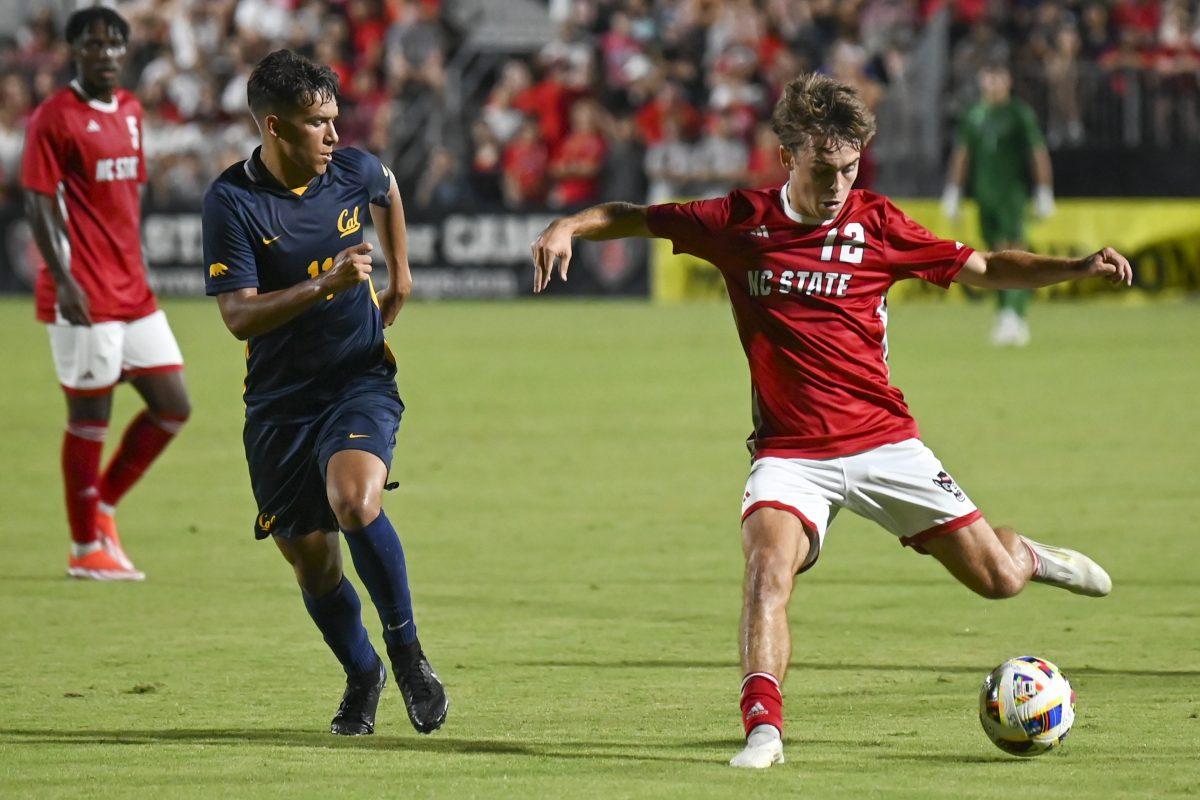 Junior midfielder Taig Healy passes the ball during the game against Cal at Dail Soccer Field on Friday, Sept. 6, 2024. Healy attempted two shots on the goal. NC State beat Cal 2-1.