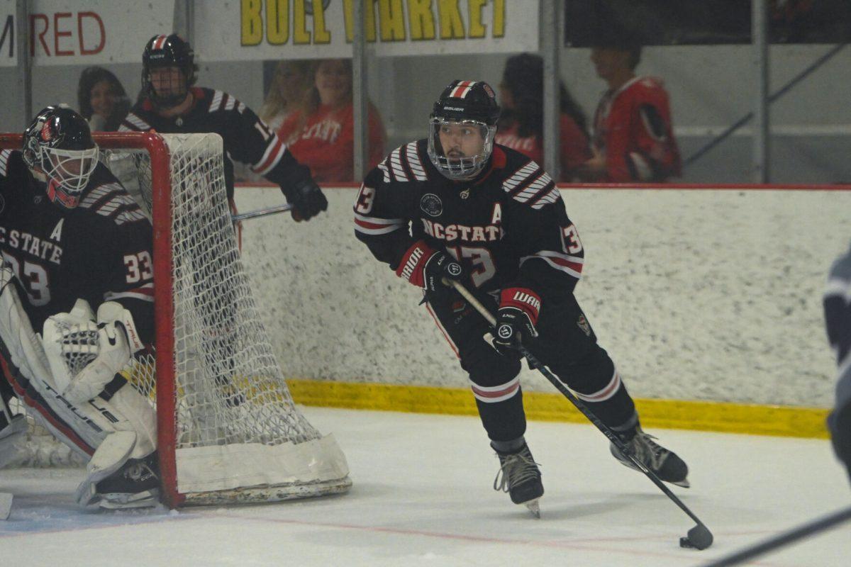 Junior defenseman Nick Librizzi steals the puck during the game against High Point University at Invisalign Arena on Friday, Sept. 6, 2024. Librizzi scored one goal during the game. NC State won 8-2.