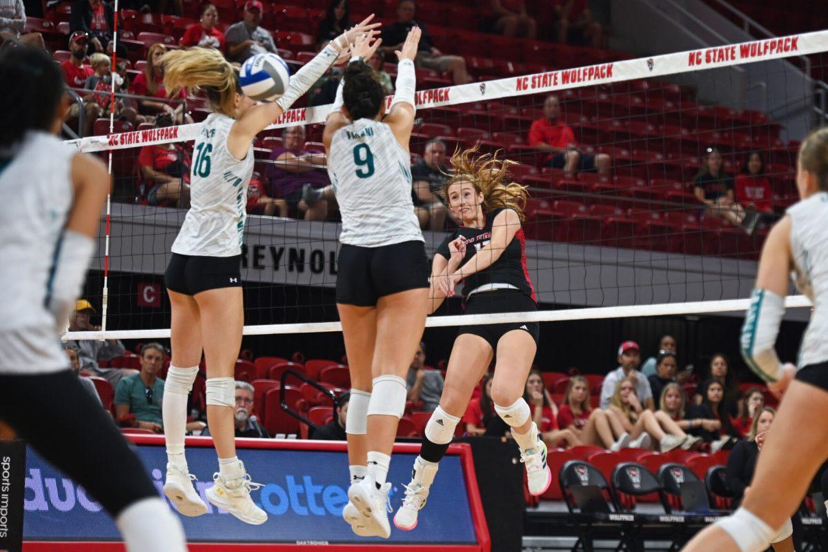Senior opposite hitter Amanda Rice spikes the ball during the game against Coastal Carolina in Reynolds Coliseum on Sunday, Sept. 22, 2024. Rice had 18 kills. The Wolfpack lost to the Chanticleers 3-2.