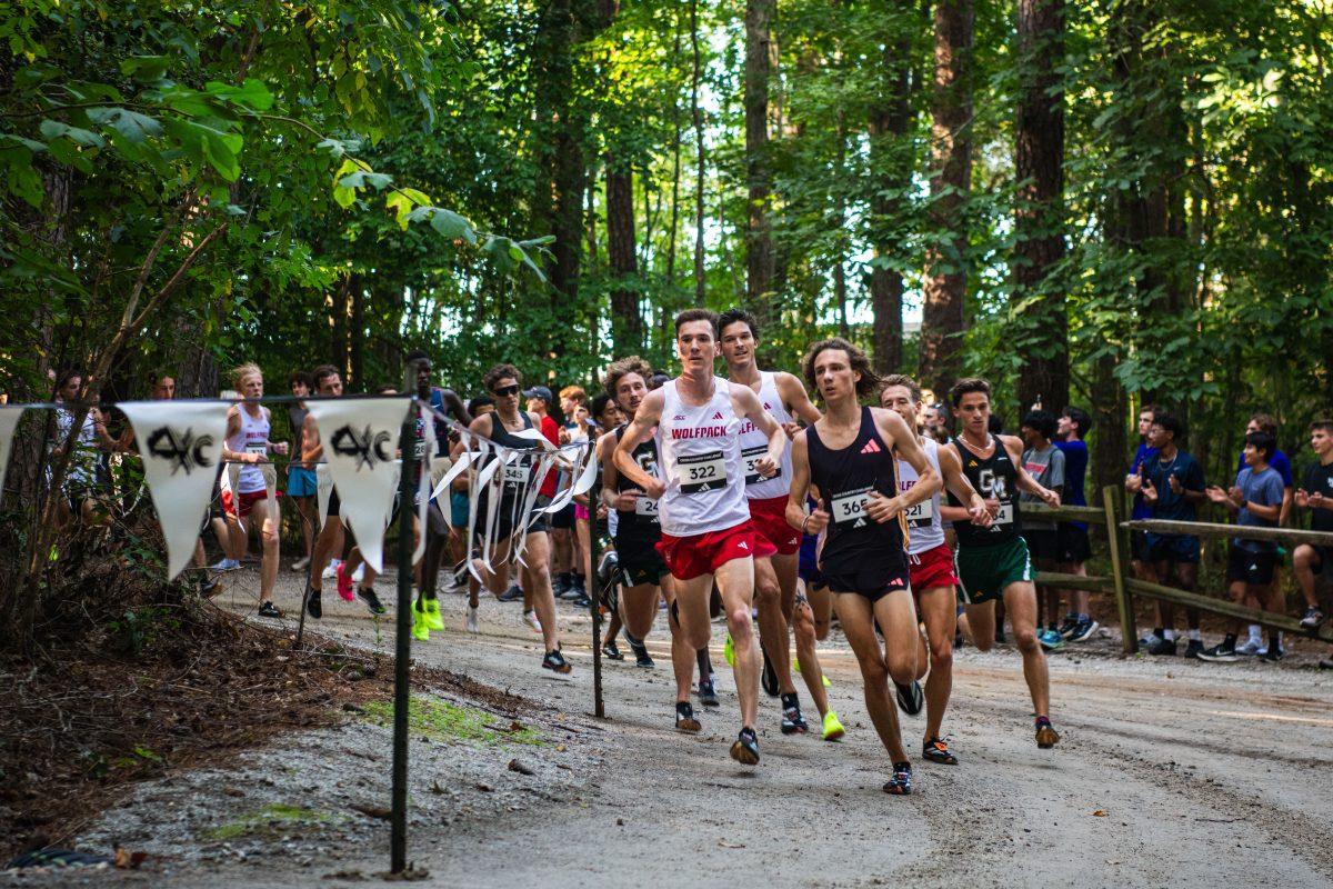 Graduate Toby Gaulter races around the corner during the Adidas XC Challenge at WakeMed Soccer Park on Friday, Sept. 20, 2024. Gaulter finished in second place with a time of 17:39.4. The NC State men's team finished in second place with a total of 51 points.