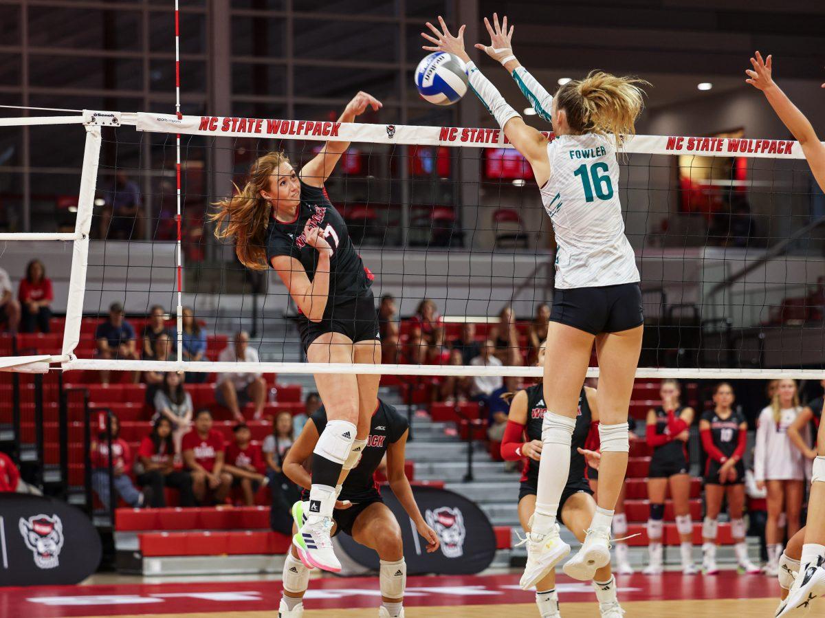 Senior outside hitter Amanda Rice spikes the ball during the game in Reynolds Coliseum on Sunday, Sept. 22nd, 2024. Rice had 18 kills. NC State lost to Coastal Carolina 3-2.